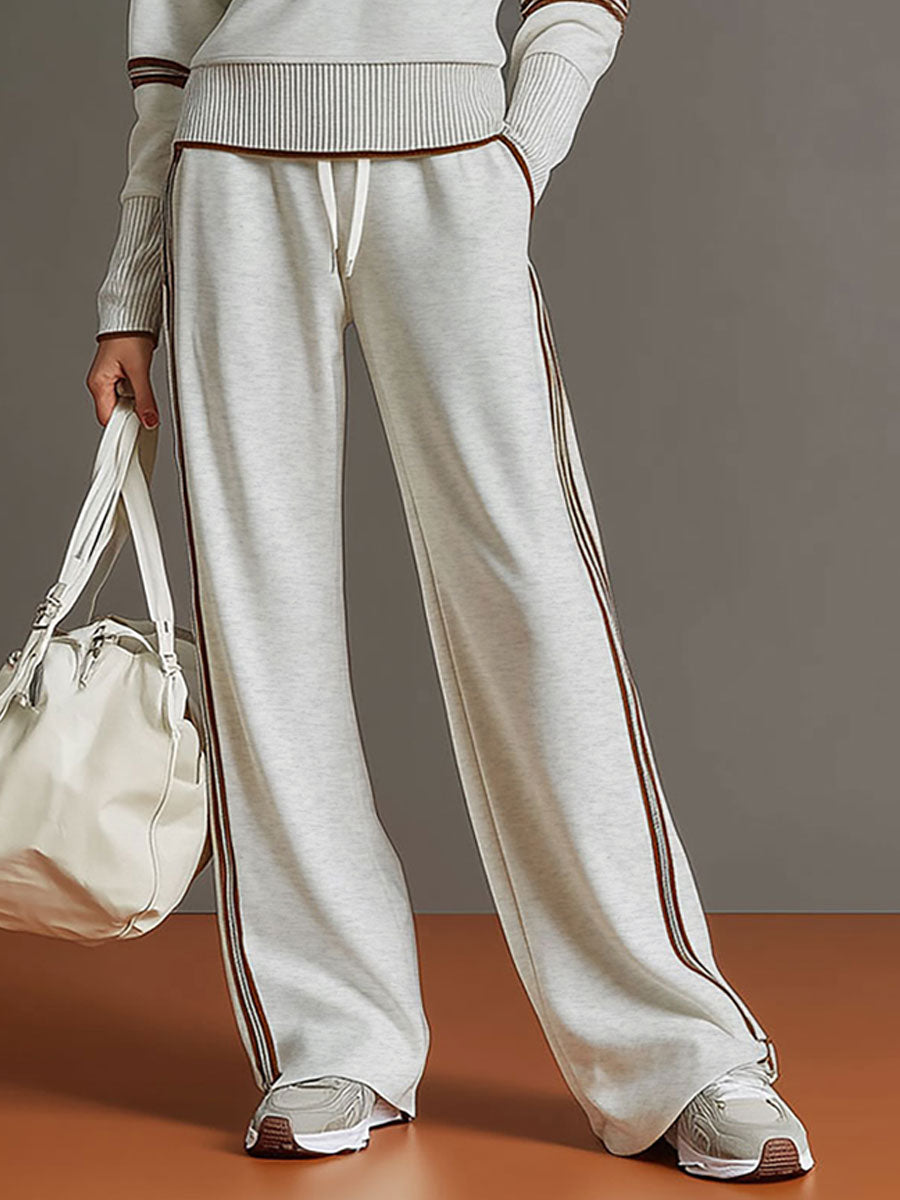 Lilith - Sportliches Hosen-Ensemble im Retro-Stil aus technischem Gewebe gestreift mit Reißverschluss