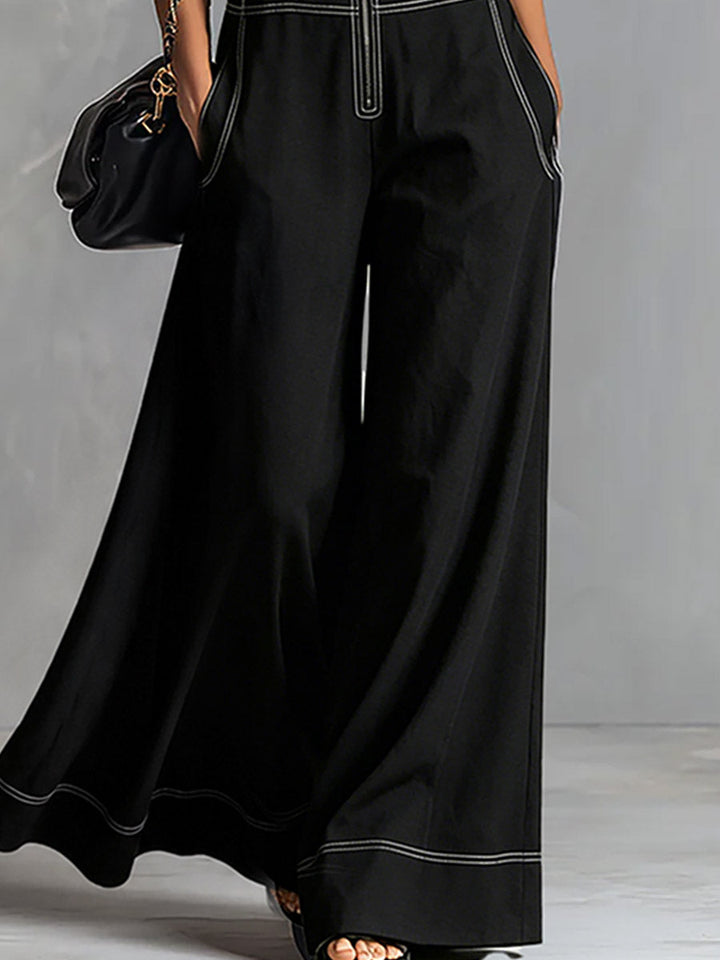 Tilda - Overall elegant für den Alltag aus Jeansstoff mit Reißverschluss und V-Ausschnitt und ärmellosem Schnitt